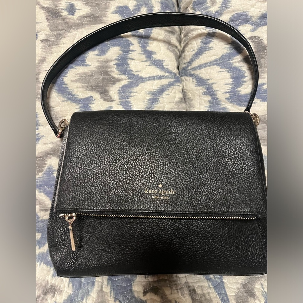 NWOT Kate Spade black shoulder bag with gold hardware.
